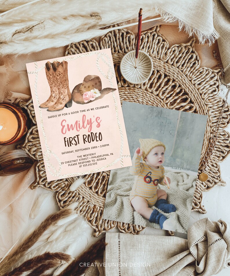 May include: A pink and white invitation with a watercolor illustration of cowboy boots and a hat. The text reads "Saddle up for a good time as we celebrate Emily's First Rodeo". The invitation includes the date, time, location, and contact information.
