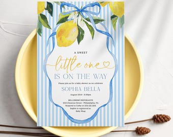 May include: A rectangular baby shower invitation card featuring a light blue and white vertical striped background, decorated with watercolor yellow lemons, green leaves, and a blue ribbon. The text reads A SWEET little one IS ON THE WAY.