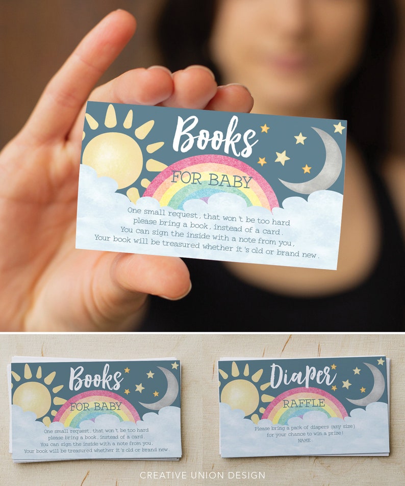 May include: Two blue and white cards with a rainbow, sun, and moon design. The text on the cards reads "Books for Baby" and "Diaper Raffle".