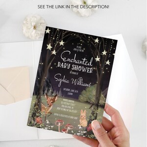 May include: A baby shower invitation with a dark blue background featuring a whimsical forest scene with glowing stars, a deer, a rabbit, and mushrooms. The text reads "Please join us for an Enchanted Baby Shower in honor of Sophia Williams, Saturday, June 26th, 3:00PM, Morris Gardens, 123 Chestnut Street, Philadelphia, PA, RSVP to Emily at 555.212.00, Sophia is registered at Baby Shop."