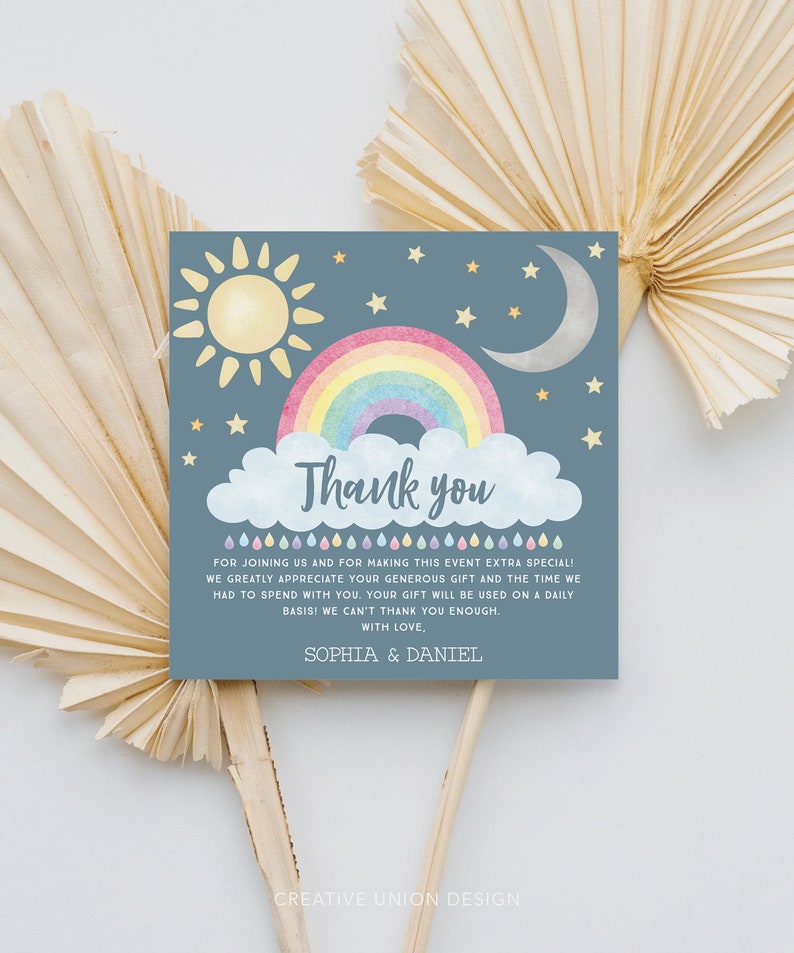 May include: A blue thank you card with a rainbow, sun, moon, and stars. The text reads "Thank you" and "For joining us and for making this event extra special! We greatly appreciate your generous gift and the time we had to spend with you. Your gift will be used on a daily basis! We can't thank you enough. With love, Sophia & Daniel."