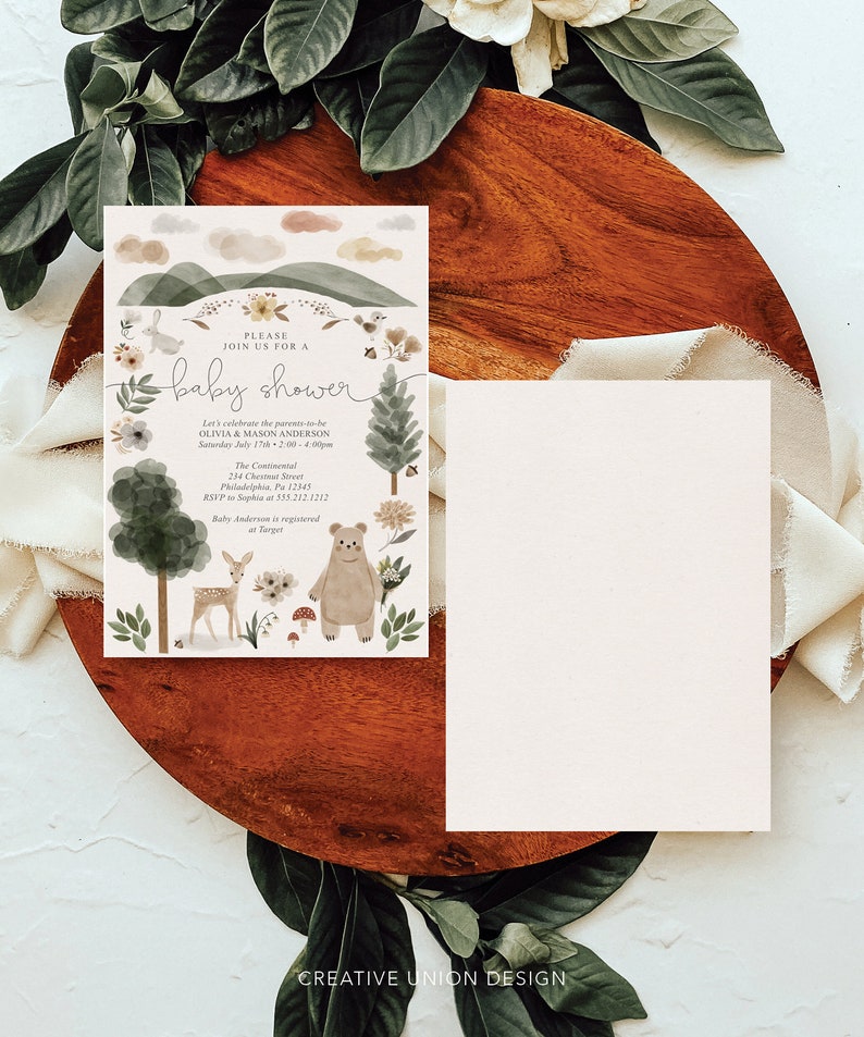 May include: A baby shower invitation with a woodland theme. The invitation features a watercolor illustration of a bear, a deer, and a forest scene. The text on the invitation reads "Please join us for a baby shower" and includes the date, time, and location of the event. RSVP information is also included.