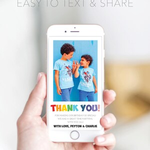May include: A smartphone displays a birthday thank you card. The card features two boys in blue shirts, the words "THANK YOU!" in rainbow colors, and the message "FOR MAKING OUR BIRTHDAY SO SPECIAL!" The card is signed "WITH LOVE, PEYTON & CHARLIE."