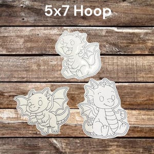 May include: Three white dragon-shaped embroidery patches with black outlines, featuring different poses and expressions. The text 5x7 Hoop is displayed at the top. These patches are designed for a 5x7 inch embroidery hoop size.