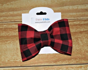 May include: Red and black plaid bow tie with a white tag that says "Paw Kids" and "www.pawkidsllc.com".