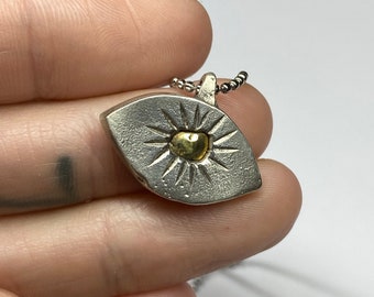 Oracle Eye sand cast pendant