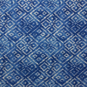 May include: Blue and white fabric with a geometric diamond pattern. The fabric has a subtle watercolor effect.