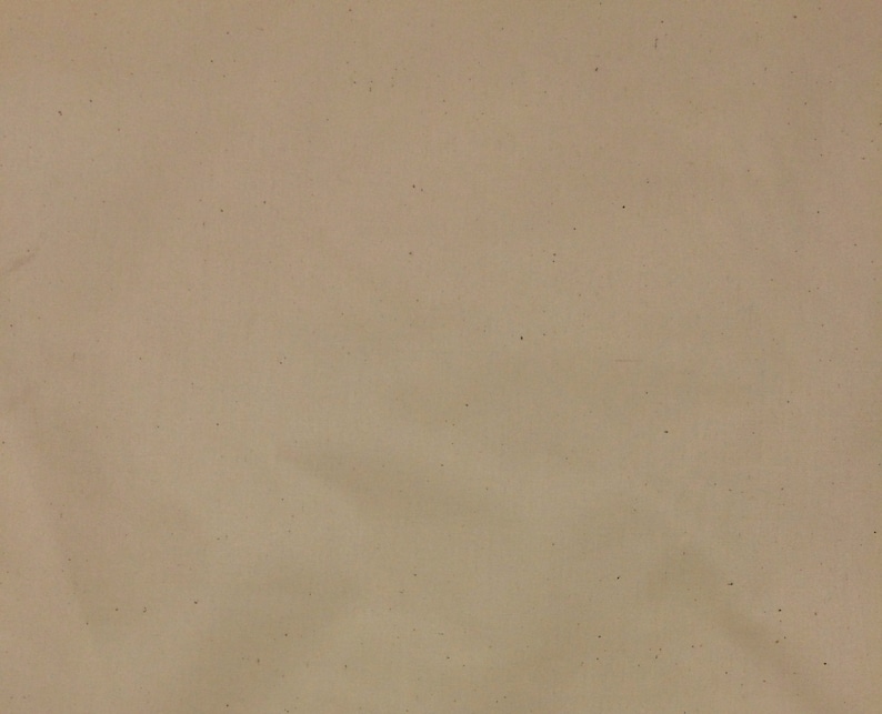 May include: A plain, off-white canvas fabric with a subtle texture. The fabric has a slightly rough, natural feel.