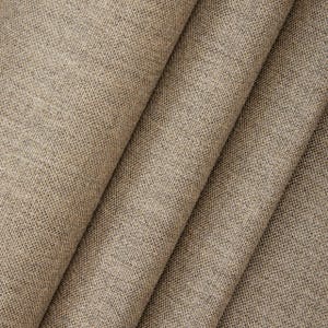 May include: Close-up of folded tan fabric with a woven texture. The fabric has a natural, neutral color and appears to be a medium-weight material, suitable for upholstery or drapery. The folds create shadows and depth.