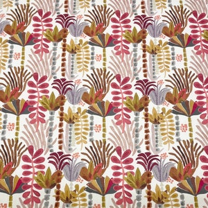 May include: A white fabric with a repeating pattern of stylized brown, pink, and purple palm trees and leaves.