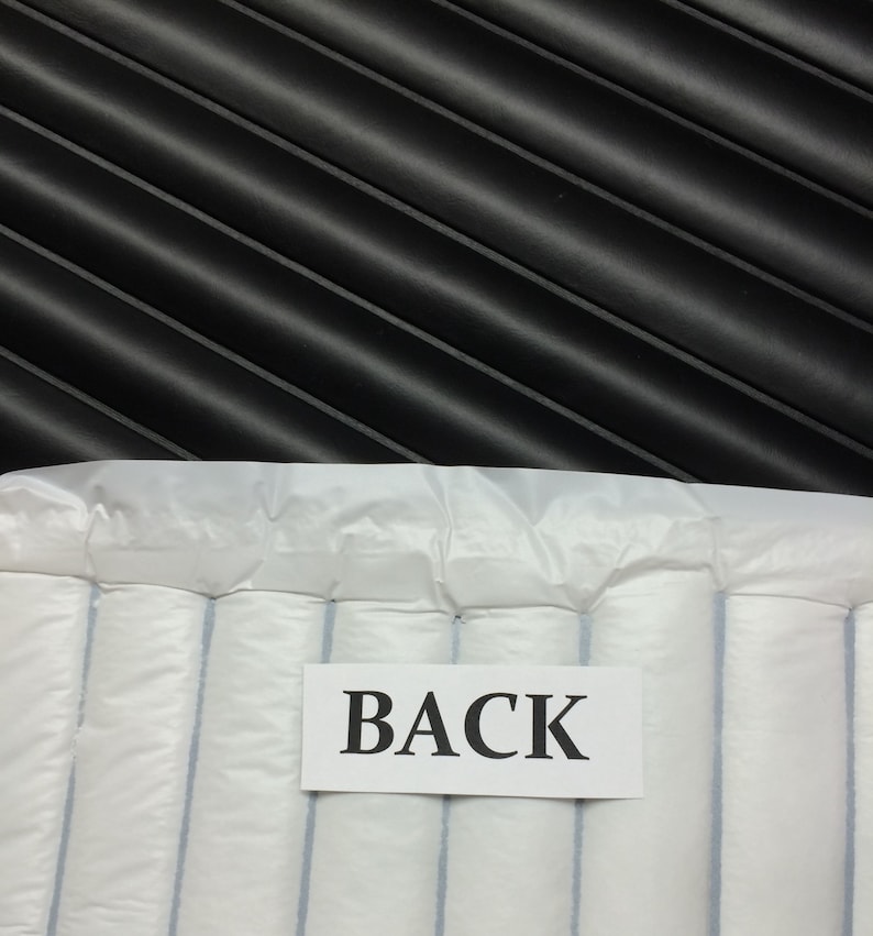 May include: White padded envelope with the word "BACK" printed on a white label.