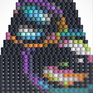 May include: Abstract geometric design made of small, dark grey blocks. The design features a gradient of colours, including purple, blue, green, orange, and pink. The overall shape is triangular, with a blurred, decorative element at the base.