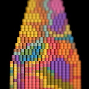 May include: A colorful, abstract image featuring a pyramid shape composed of numerous small, square blocks. The blocks display a gradient of colors, including red, pink, orange, yellow, green, blue, and purple, against a black background. The image has a blurred effect.