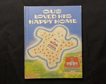 Gus amou seu lar feliz por Jane Thayer, Illust por Seymour Fleishman, Weekly Reader, 1989 HB