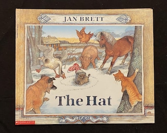 The Hat by Jan Brett, 1997 Hard Cover - Scholastic, Inc