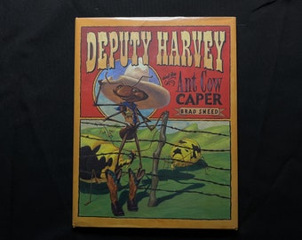 Deputy Harvey and the Ant Cow Caper, di Brad Sneed, 2005 HC con DJ ricoperto di cellophane, prima edizione, firmato, Dial Books for Young Readers Penguin