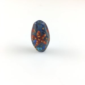 One Oval Lampwork glass 25mmx15mmx10mm blue orange starfish D-blue orange