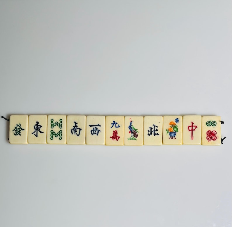 One strand carved bone Mahjong tiles/two holes;one side design Large-Winds