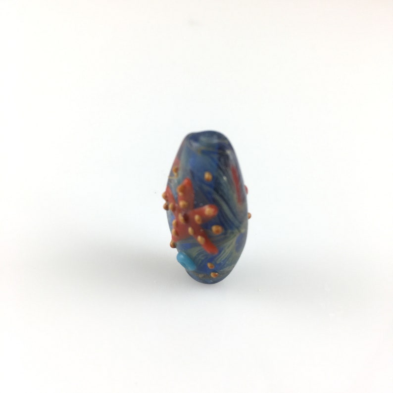 One Oval Lampwork glass 25mmx15mmx10mm blue orange starfish image 5