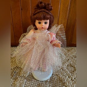 Rare madame Alexander “glitter girl” collectible 8” doll with Kaiser doll stand