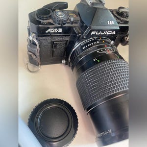 Fujica AX-3 Black & Chrome 35MM film Camera With X-Fujinon 1:1.9 f-50mm FM 3 Lenses fujifilm with extra lens and foam carrying case bag