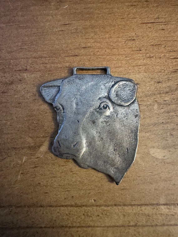 Early 1900's sterling Hussmann cow watch fob