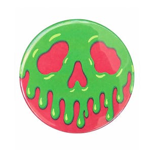 May include: A circular pinback button featuring a graphic illustration of a stylized skull. The skull is rendered in a vibrant green color with a dripping effect, set against a solid red background. The design has a smooth, glossy finish.