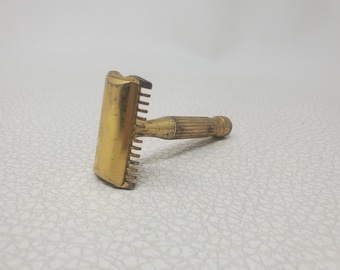 Antiek vintage goudkleurig Segal veiligheidsscheermes met dubbele rand