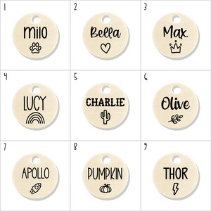 Peut inclure: Neuf &eacute;tiquettes d'identification pour animaux de compagnie rondes en bois avec diff&eacute;rents noms et motifs. Les noms incluent Milo, Bella, Max, Lucy, Charlie, Olive, Apollo, Pumpkin et Thor. Les motifs incluent une empreinte de patte, un c&oelig;ur, une couronne, un arc-en-ciel, un cactus, une branche, une fus&eacute;e, une citrouille et un &eacute;clair.