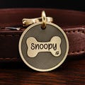 Personalized Brass Bone Dog Tag: Custom Paw Print, Stripe Collar Tag product logo