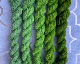 Uranium on yak: superwash merino, yak, nylon blend, 4ply fingering weight yarn, five mini skeins ombré set, shades of lime/moss green