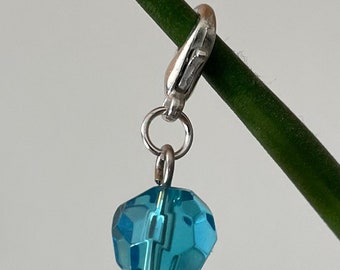 Limited edition blue faceted spherical stitch marker, progress marker, stitch keeper