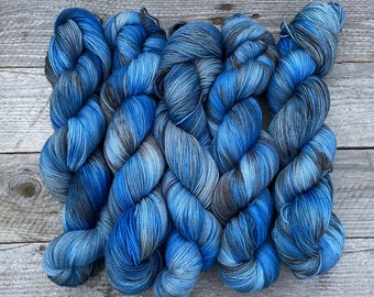 Taurus: Fingering weight 4ply sock yarn hand dyed in shades of blue and brown, lapis lazuli and tiger’s eye gemstone inspired, zodiac theme