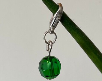 Limited edition green faceted spherical stitch marker, progress marker, stitch keeper