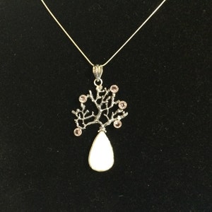 pink coral pendant, comes with sterling chain