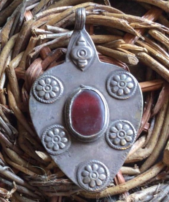 Turkmen silver pendant and glassware with pendants