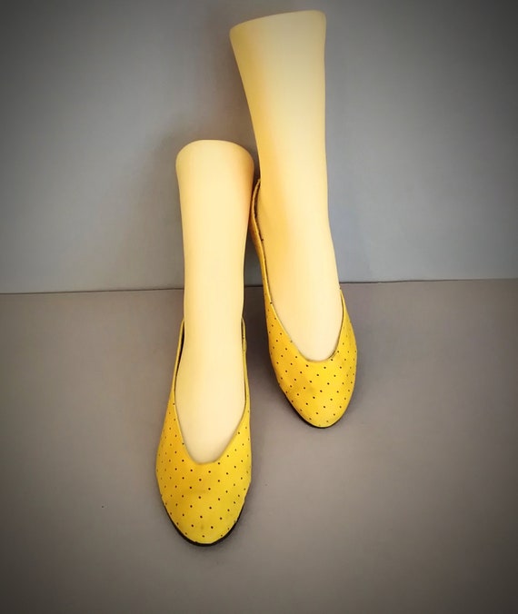 yellow flat pumps