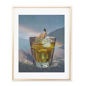 May include: A collage artwork featuring a woman sitting on a piece of ice in a glass of amber liquid. The glass is surrounded by a mountain landscape with a rainbow in the background.