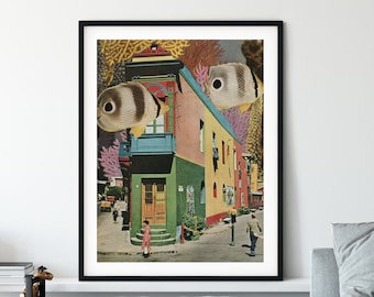 May include: A colorful, multi-story building with a green door and a blue awning. Two black and white fish are floating above the building, surrounded by coral and other aquatic plants.