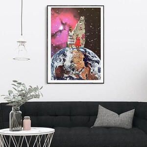 May include: A framed collage art print featuring a pink and purple nebula with a staircase leading up to a woman and a child standing on a globe. The globe is a representation of Earth.