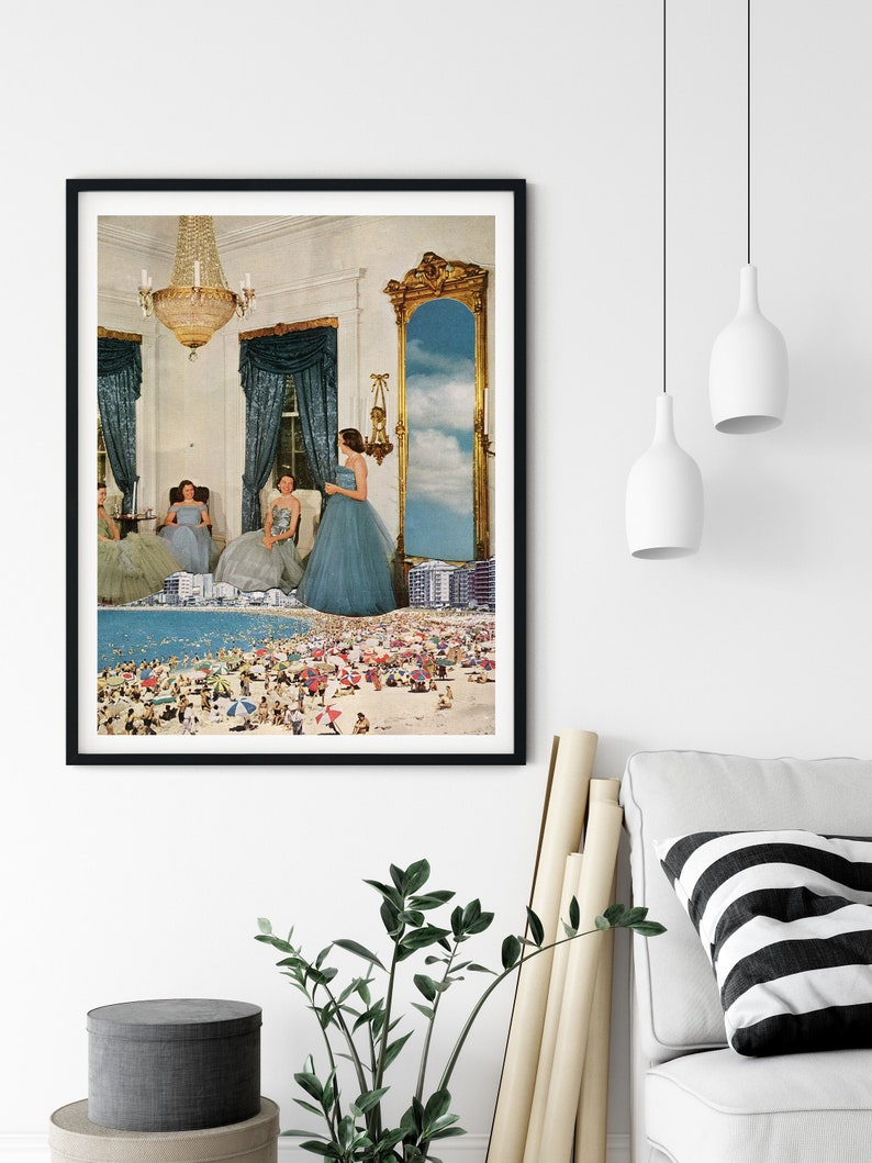 May include: A framed collage art print featuring a vintage photograph of three women in elegant dresses standing in a room with a large ornate mirror. The mirror reflects a beach scene with people and umbrellas.