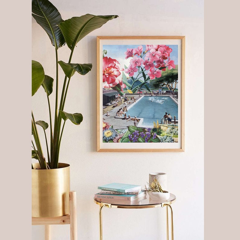 May include: A framed print of a collage featuring a swimming pool with people in it, surrounded by pink flowers and green foliage.