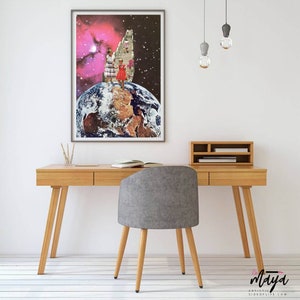 May include: A collage art print featuring a group of people walking up a staircase that leads to a pink nebula in space. The staircase is on top of a globe representing Earth.