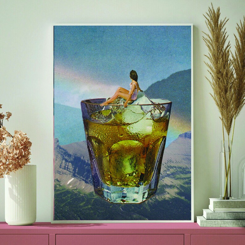 May include: A collage image of a woman sitting on a large ice cube in a glass of amber liquid. The glass is surrounded by a green and brown landscape.