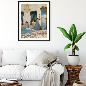 May include: A framed collage art print featuring three women in blue dresses standing in a room with a large mirror reflecting a beach scene with people.