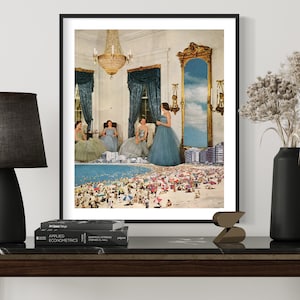 May include: A framed collage art print featuring four women in blue dresses standing in a room with a large mirror reflecting a beach scene with a crowd of people.