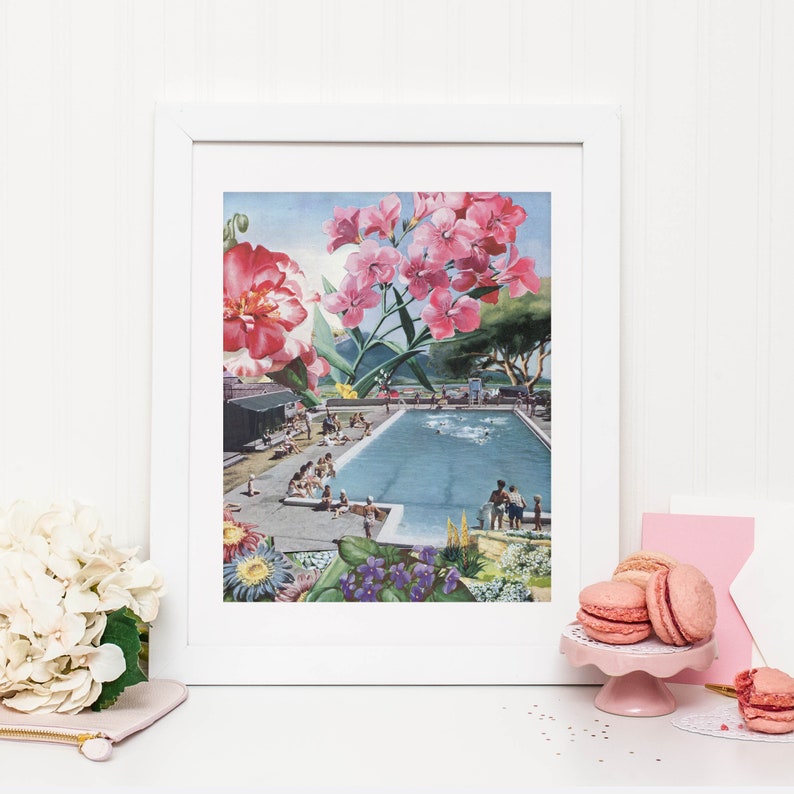 May include: A framed collage featuring a swimming pool with people in it, surrounded by pink and white flowers. The flowers are layered over the image of the pool, creating a whimsical and surreal effect.