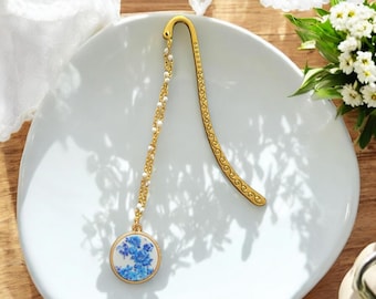 Metal hook bookmark with blue and white ceramic charm
