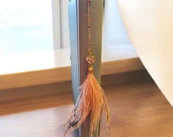 Metal hook bookmark with white gemstone and feminine pink feathers