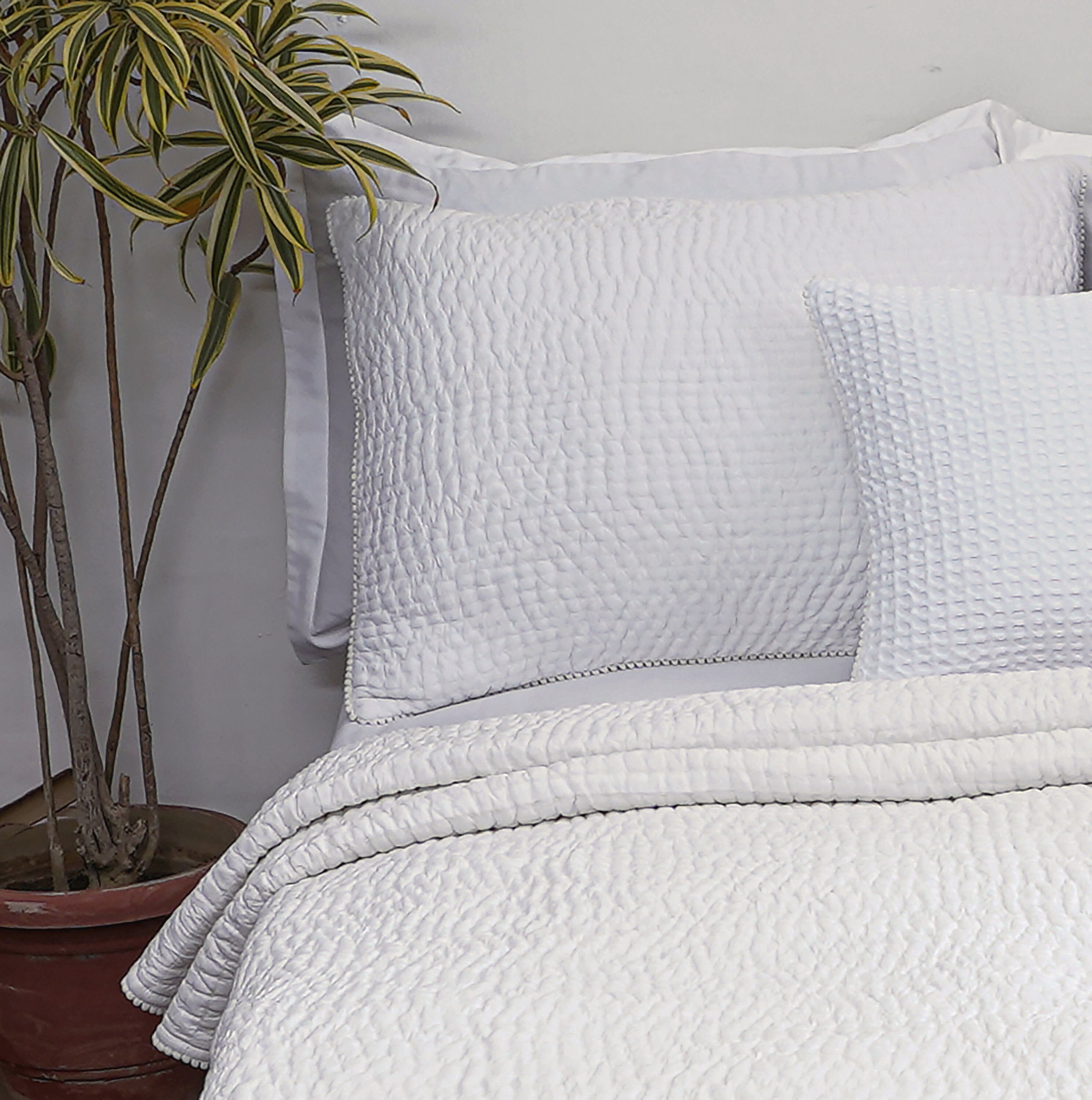 quilted white bedding